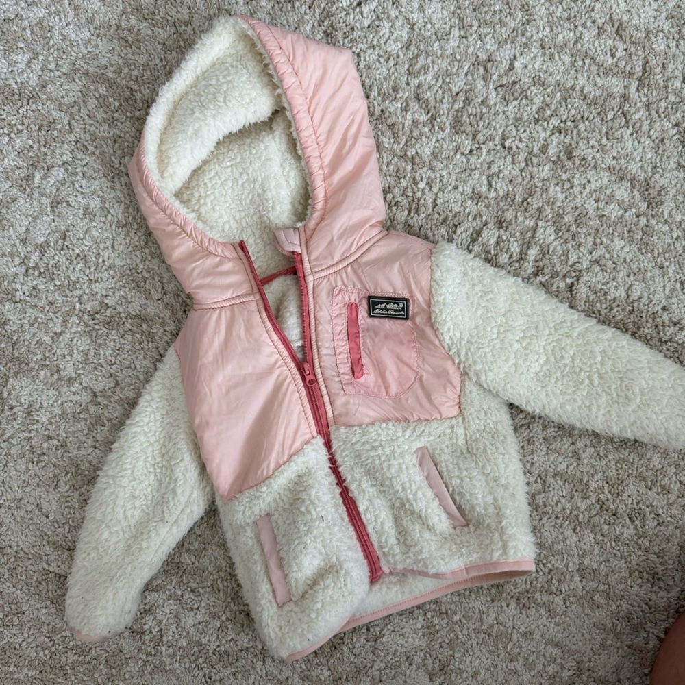 White and pink fleece jacket